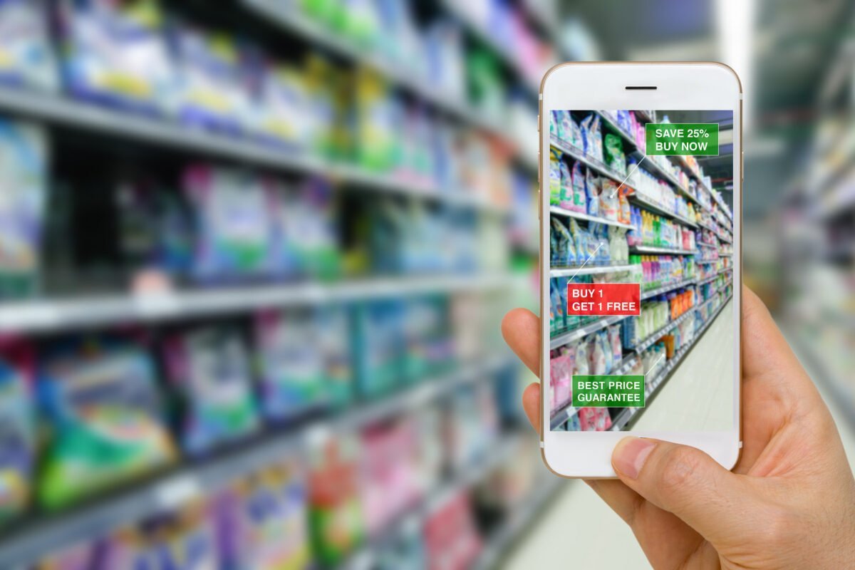 phone in hand using augmented reality for shopping